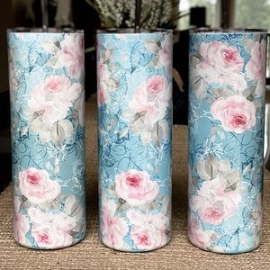 New. Floral 20oz Tumbler with lids.
